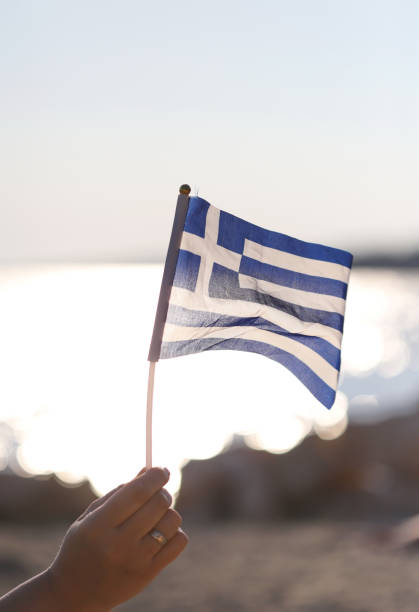 istock Greek flag in the wind 1613687591