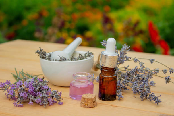 istock lavender essential oil, on a wooden background. Selective focus. 1613698535