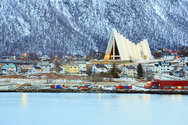 Tromso Cityscape Arctic Cathedral Tromso Cityscape with Arctic Cathedral Church in Norway at dusk twilight tromso stock pictures, royalty-free photos & images