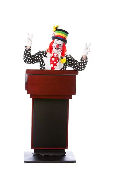 Photo of Clowns: Politcs Candidate Speaker Speech Podium Peace Hand Signa