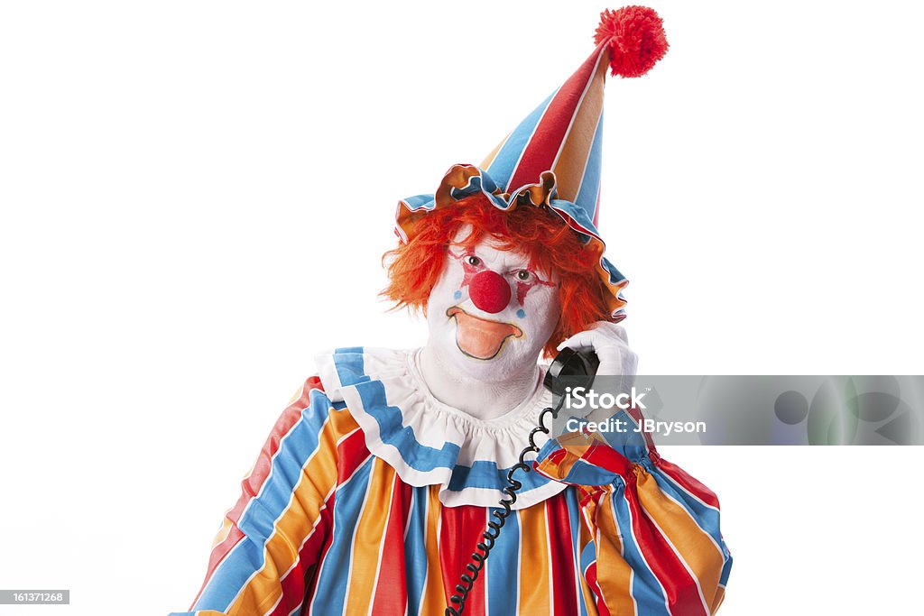 Clowns: Adult Male Talking on Phone Head Shoulders A head and sholders image of a smiling adult male clown talking on the phone.http://www.janibrysonstudios.com/Banners/Clowns Clown Stock Photo