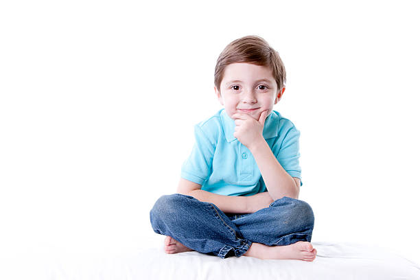 istock Real People: Thinking Smiling Caucasian Little Boy Sitting Cross Legged 161371289
