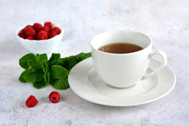 istock hot mint tea in the white cup isolated on gray background copy space 1613721031