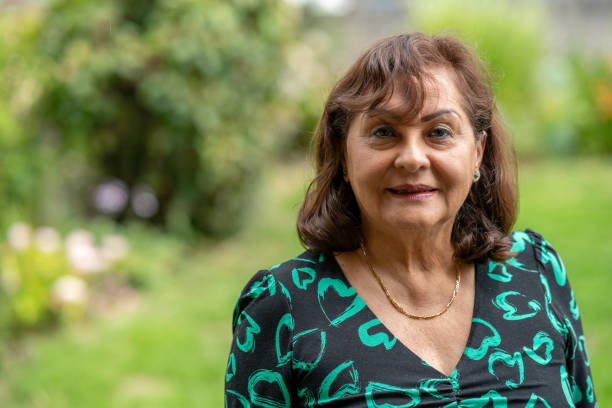 istock Senior Hispanic woman headshot 1613721042
