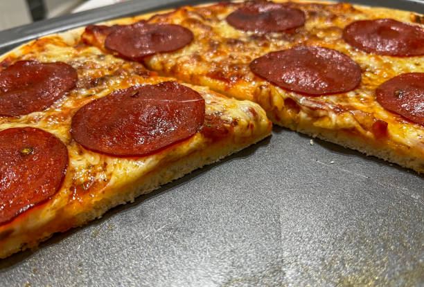 istock Homemade pizza close-up 1613722095