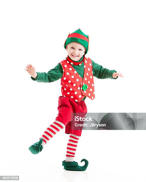 Niño Vestido Como Elf Baila Feliz Navidad Plantilla Foto de stock y más banco de imágenes de Elfo