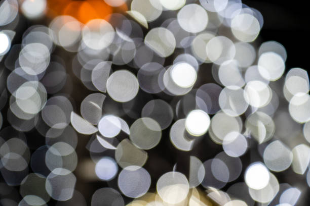 Abstract bokeh with white and yellow lights background illustration