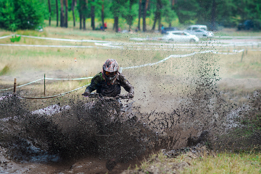 ATV, UTV, buggy, 4x4 off-road vehicle in a muddy water. Extreme, adrenalin