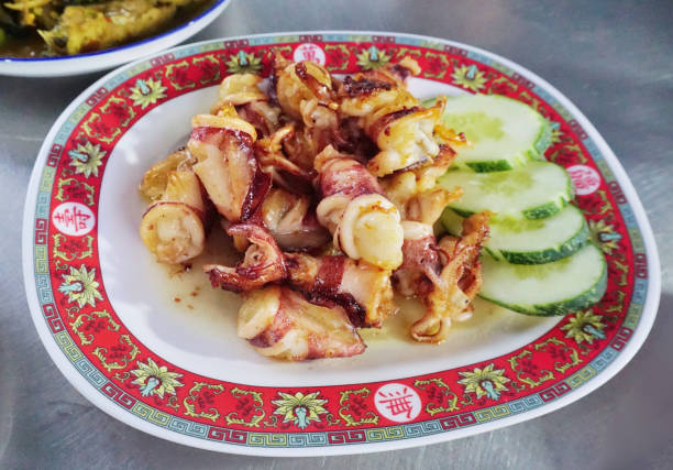 istock Crisp garlic egged squid or calamari in dish, Seafood menu 1613775622