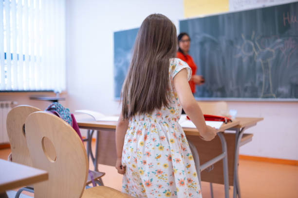 istock Teaching elementary school children how to behave in school 1613783182