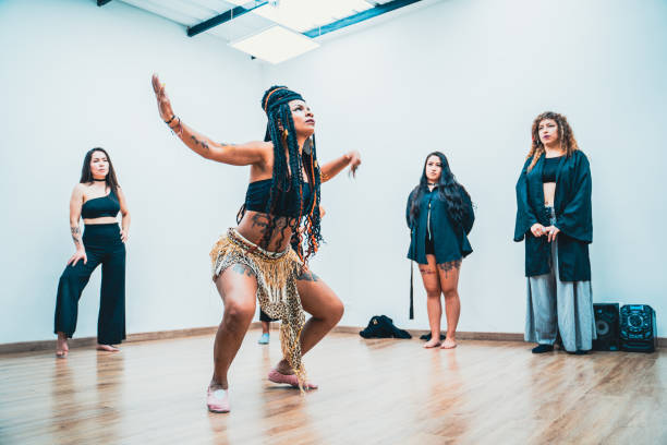 istock Female dancer rehearsing choreography at dance studio 1613819173