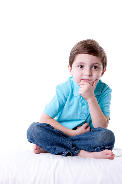 istock Real People: Thinking Content Caucasian Little Boy Sitting Cross Legged 161382640
