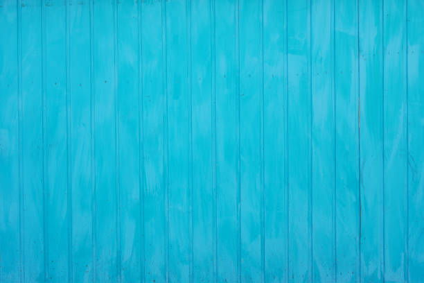 wooden wall paneling background painted cyan blue