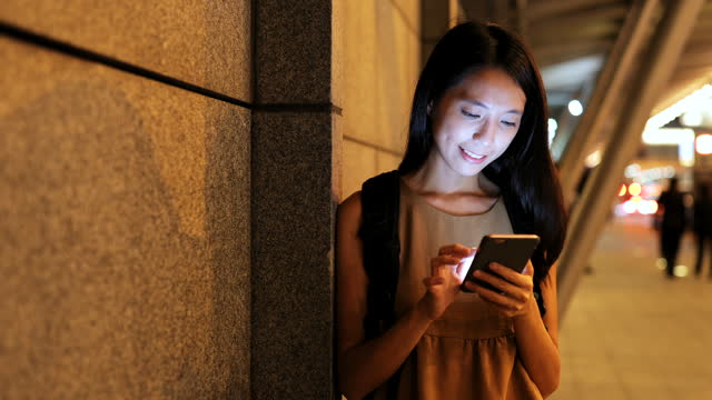 Woman looking at mobile phone