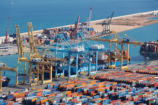 Barcelona, Spain - july 2022: Barcelona Commercial Port seen from Above with Container Depot.