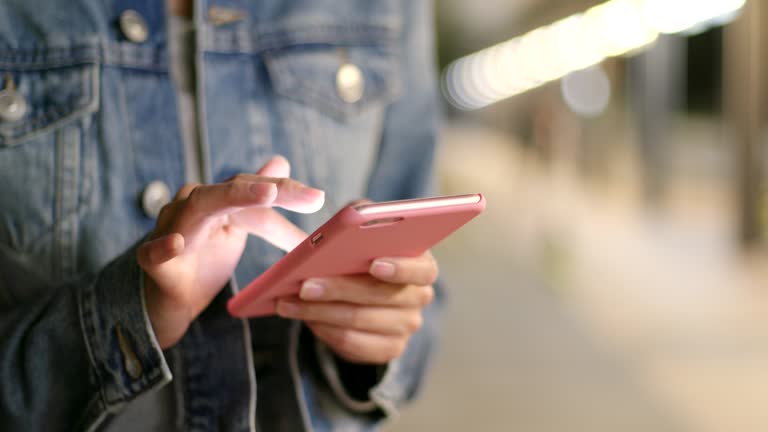 Woman use of smart phone at night