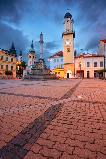 Cityscape image of downtown Banska Bystrica, Slovakia with the Slovak National Uprising Square at summer sunset.