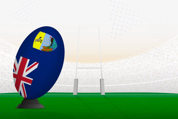 istock Saint Helena national team rugby ball on rugby stadium and goal posts, preparing for a penalty or free kick. 1613953099