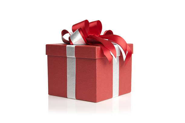 istock Red gift box with silver ribbon and red bow on white background, 1613957817