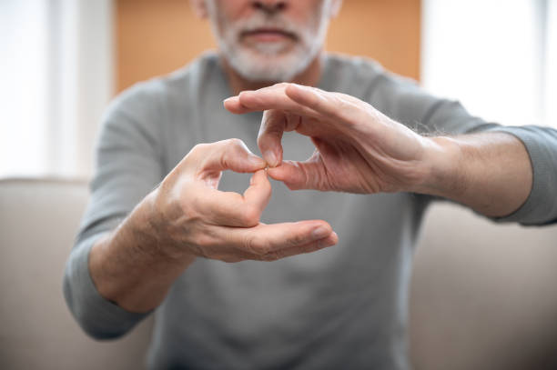 cropped shot of mature man communicate with sign language