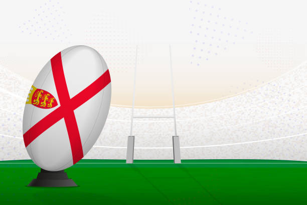 istock Jersey national team rugby ball on rugby stadium and goal posts, preparing for a penalty or free kick. 1614010693