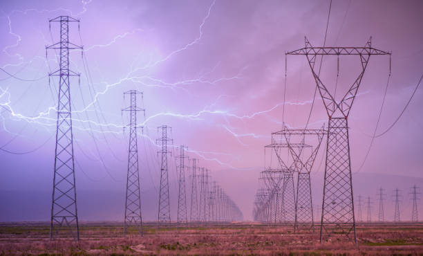 istock High voltage power line with amazing lightning 1614018916