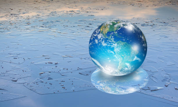 istock Glass Globe (planet earth) on ice 