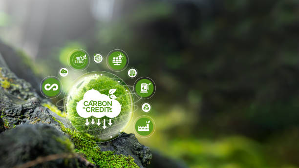 istock Carbon credit concept with icon on green globe reducing carbon emissions carbon neutral concept Zero net greenhouse gas emissions target Carbon footprint reduction, CO2 emissions, low emissions and carbon offsetting. 1614045655