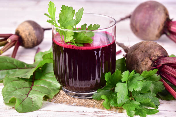 istock Beetroot juice in a glass. Useful healing drink. 1614062023