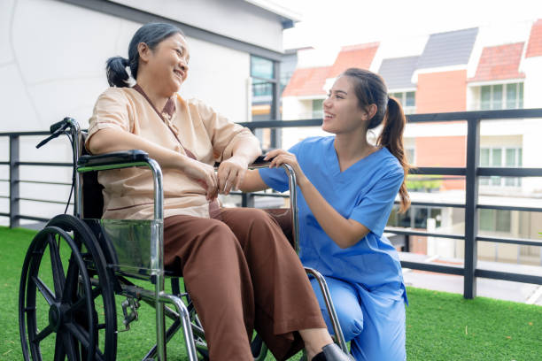istock Elderly Asian woman is well cared for by a nursing home worker. 1614096593