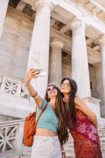 istock Female tourists taking selfie 1614110439