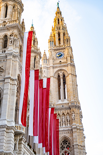 Many flags of Austria on the building of the town hall in Vienna.