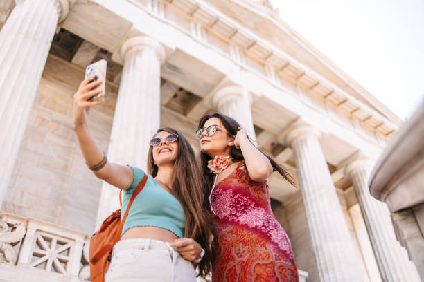 istock Female tourists taking selfie 1614114224