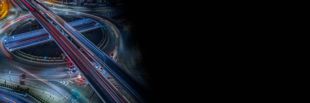 istock Expressway top view, Road traffic an important infrastructure, Drone aerial view fly in circle, traffic transportation, Public transport or commuter city life concept of economic and energ, transport 1614114784
