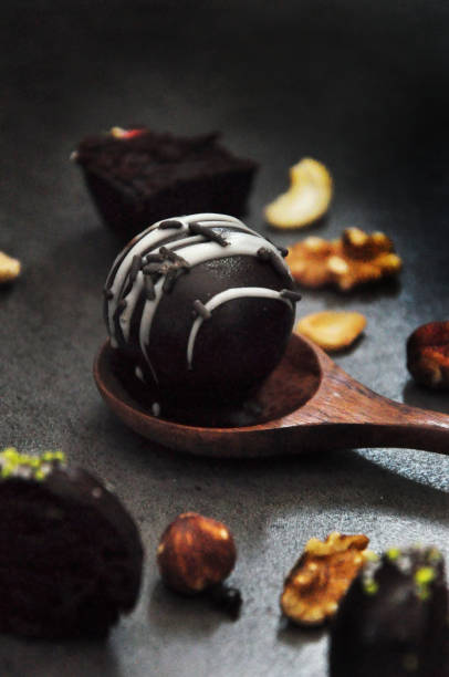 istock Close up Chocolate Ball on Wooden Spoon 1614149459