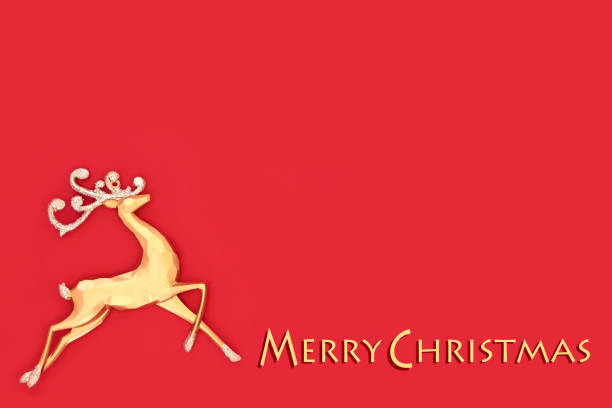 istock Merry Christmas Gold Reindeer on Red Background 1614191426