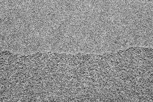 Abstract black and white photo of sand surface on a beach