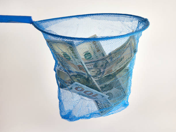 istock 100 dollar bills pour from above and fall into the grid. 1614238280