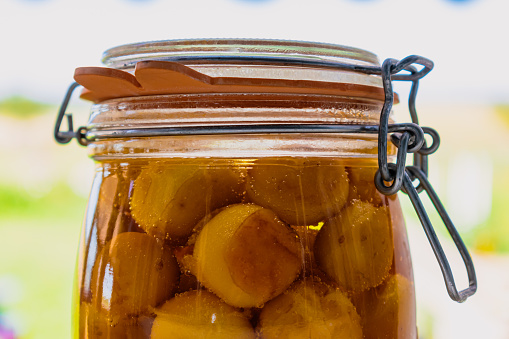 Sterilized mirabelle plums, homemade fruits in syrup for the winter, preserves nutrients