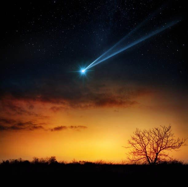 istock Comet, asteroid, meteorite flying to the planet Earth.  Glowing asteroid and tail of a falling comet threatening the safety of the Earth.  Elements of this image furnished by NASA. 1614253709