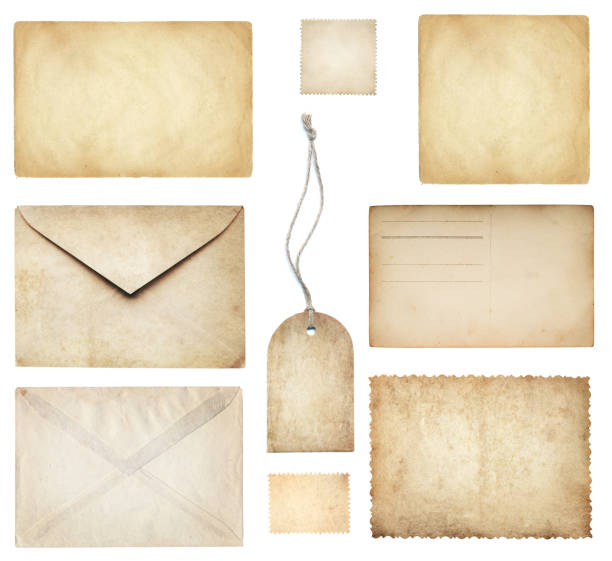 istock Ancient papers collection: letterhead, envelope, postcard, postage stamp, tag label, old paper blank isolated on white. Retro style design. 1614265354