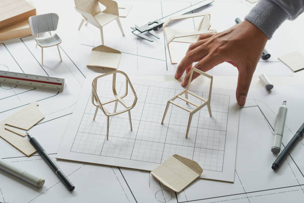 istock Designer sketching drawing design development product plan draft chair armchair Wingback Interior furniture prototype manufacturing production. designer studio concept . 1614273026
