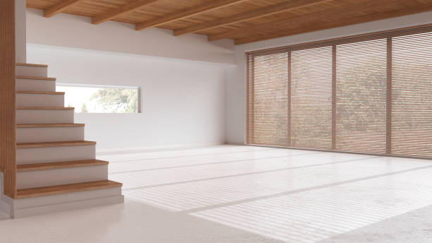istock Wooden empty room interior design, open space with resin floor, beams ceiling, white walls and staircase, modern contemporary architecture concept idea 1614291468