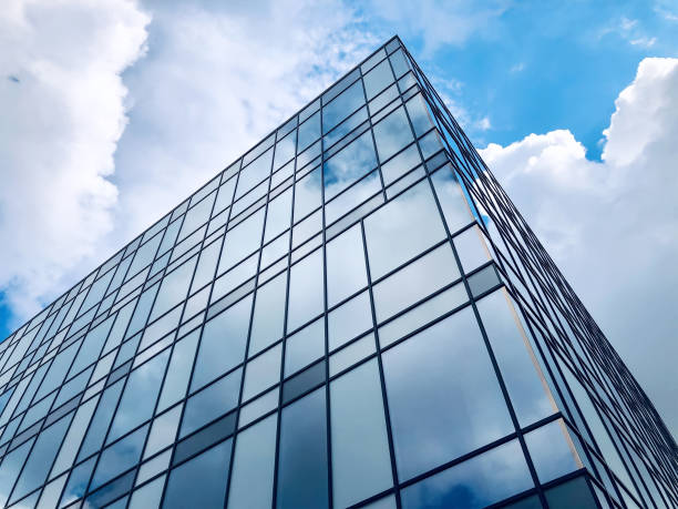 istock Urban building design concept, bottom view of modern skyscraper 1614301911
