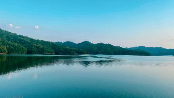 istock lake and mountains on sunset 1614306551