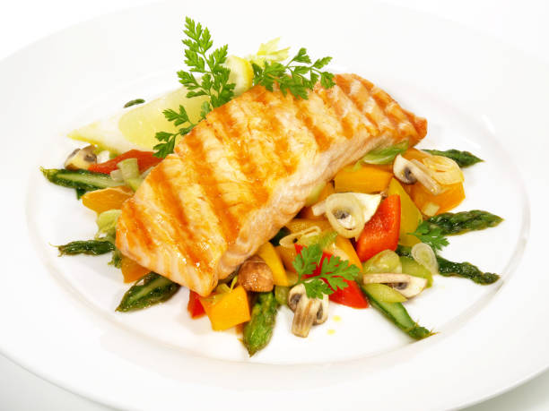 istock Grilled Salmon with green Asparagus - Isolated 1614307076