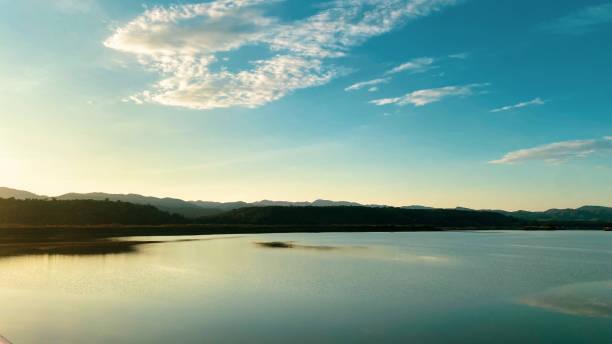 istock lake and mountains on sunset 1614308119