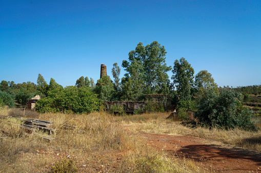 Abandoned village of a former copper and iron mine with poisoned earth and water