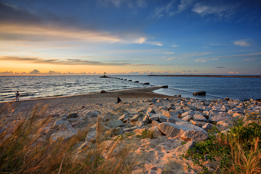 Amazing sunset on the beach at Baltic Sea in Gdansk, Poland