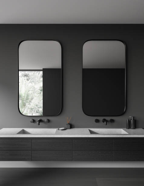 istock Gray bathroom interior with double sink 1614327837